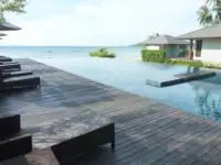 view from the pool beds next to the swimming pool on the beach