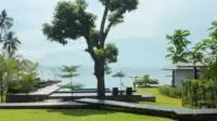 view of the gardens and swimming pool area at the Plub Pla Retreat on Koh mak