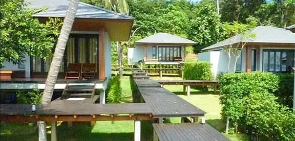 elevated wooden walkways between the villas